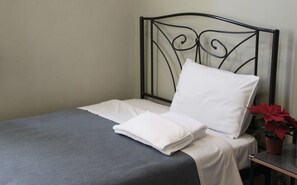 シングルルーム | 遮光カーテン、WiFi (無料)