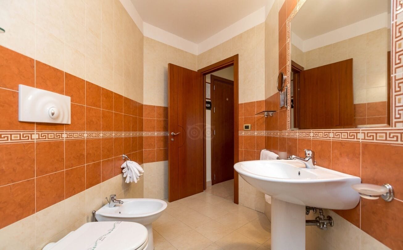 standard quadruple room | bathroom | shower, hair dryer, bathrobes, slippers