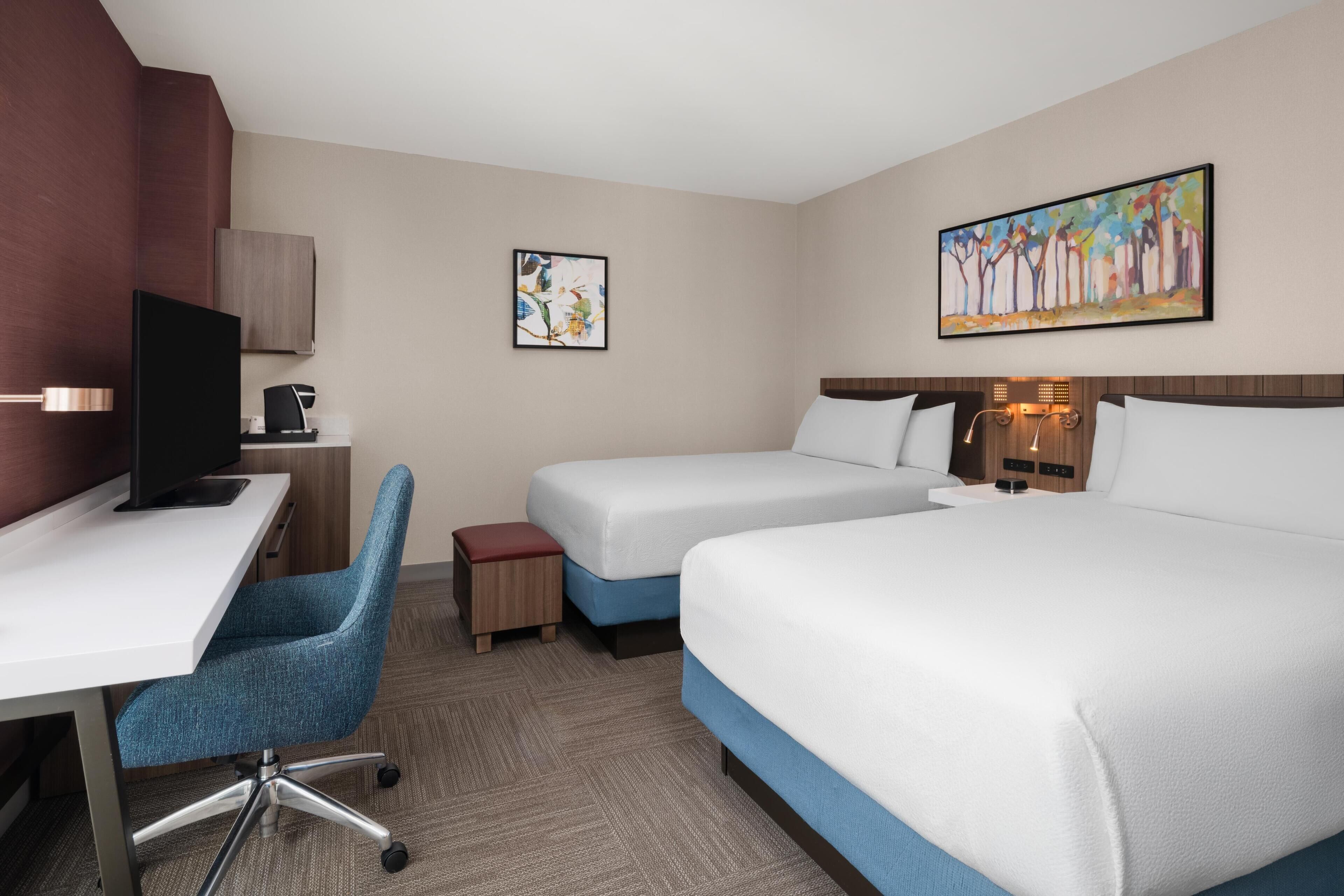 Premium bedding, down duvets, in-room safe, desk