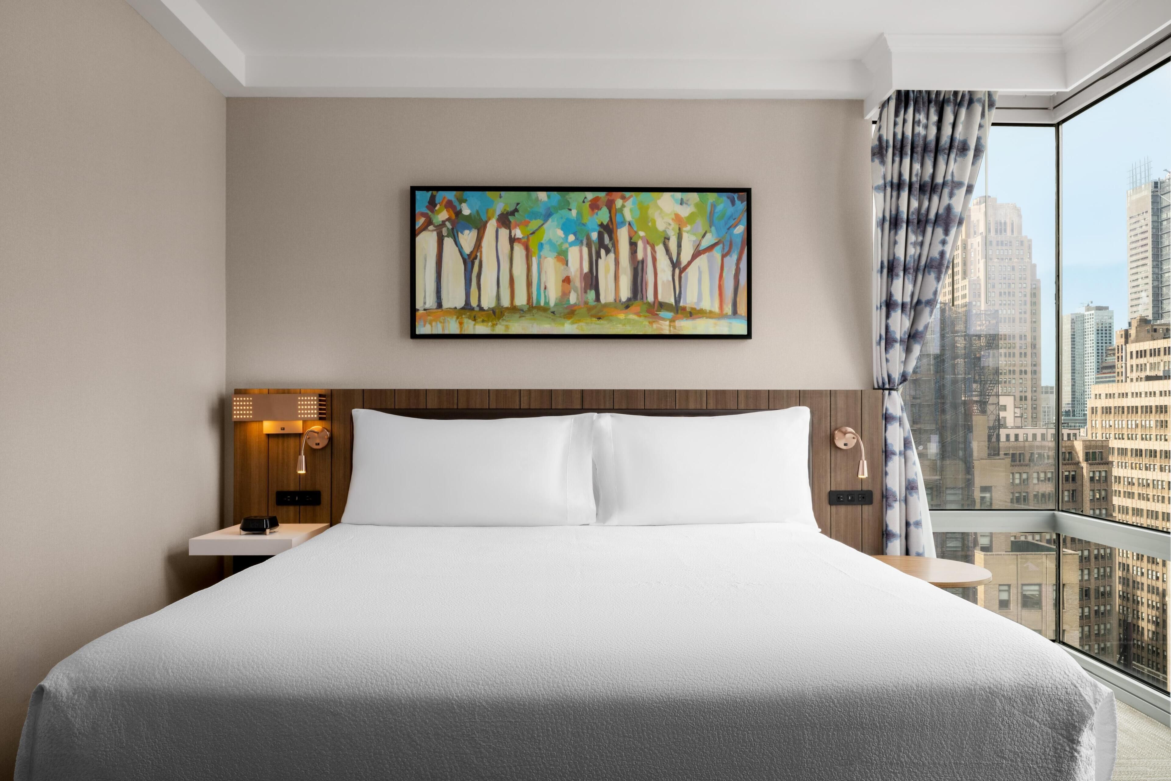 Premium bedding, down duvets, in-room safe, desk