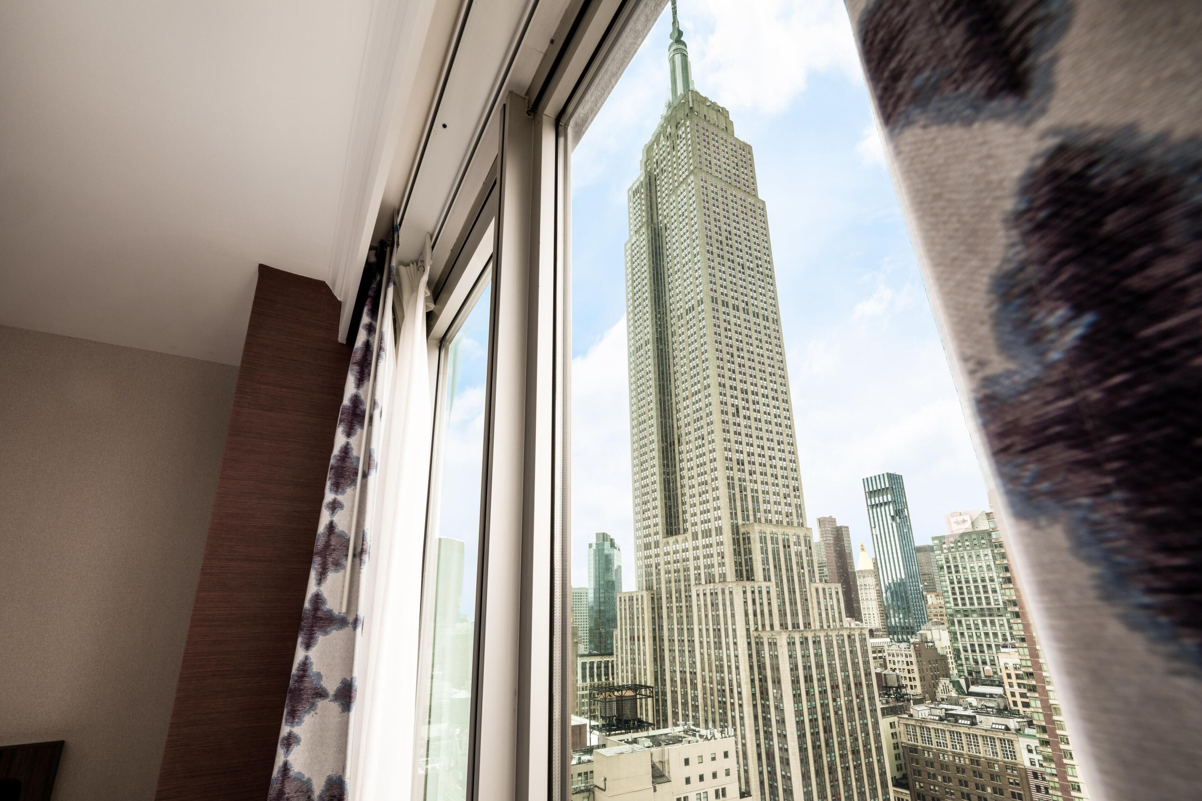 Premium bedding, down comforters, in-room safe, desk