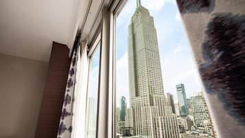 Premium bedding, down comforters, in-room safe, desk