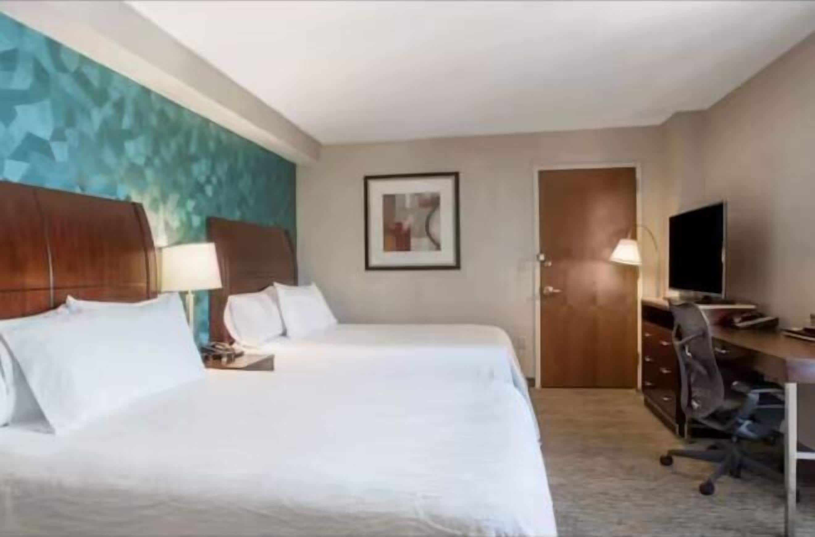 Premium bedding, down comforters, in-room safe, desk