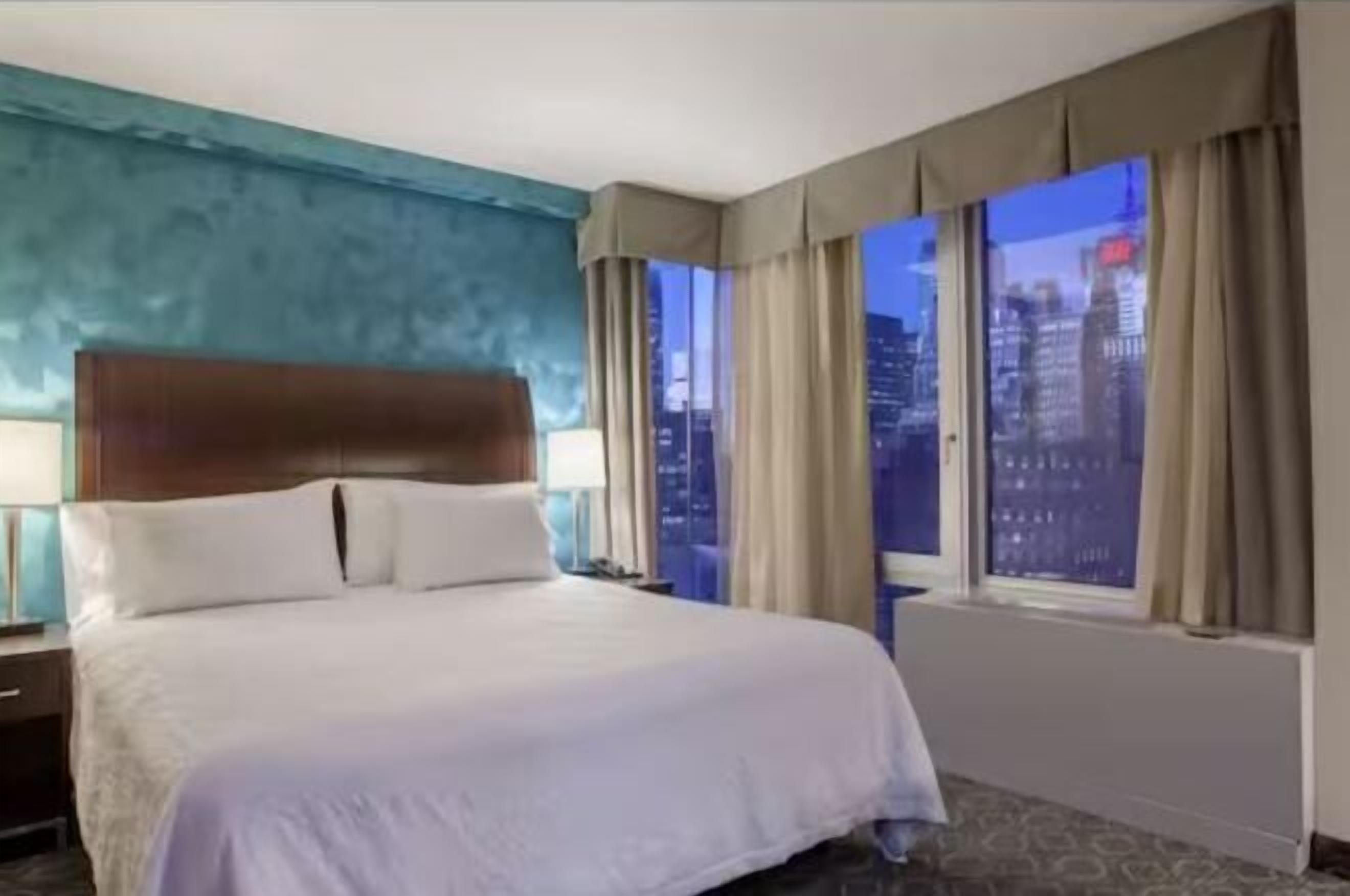 Premium bedding, down comforters, in-room safe, desk