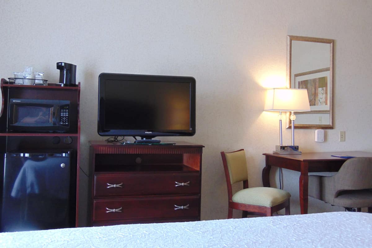 Desk, laptop workspace, blackout curtains, iron/ironing board