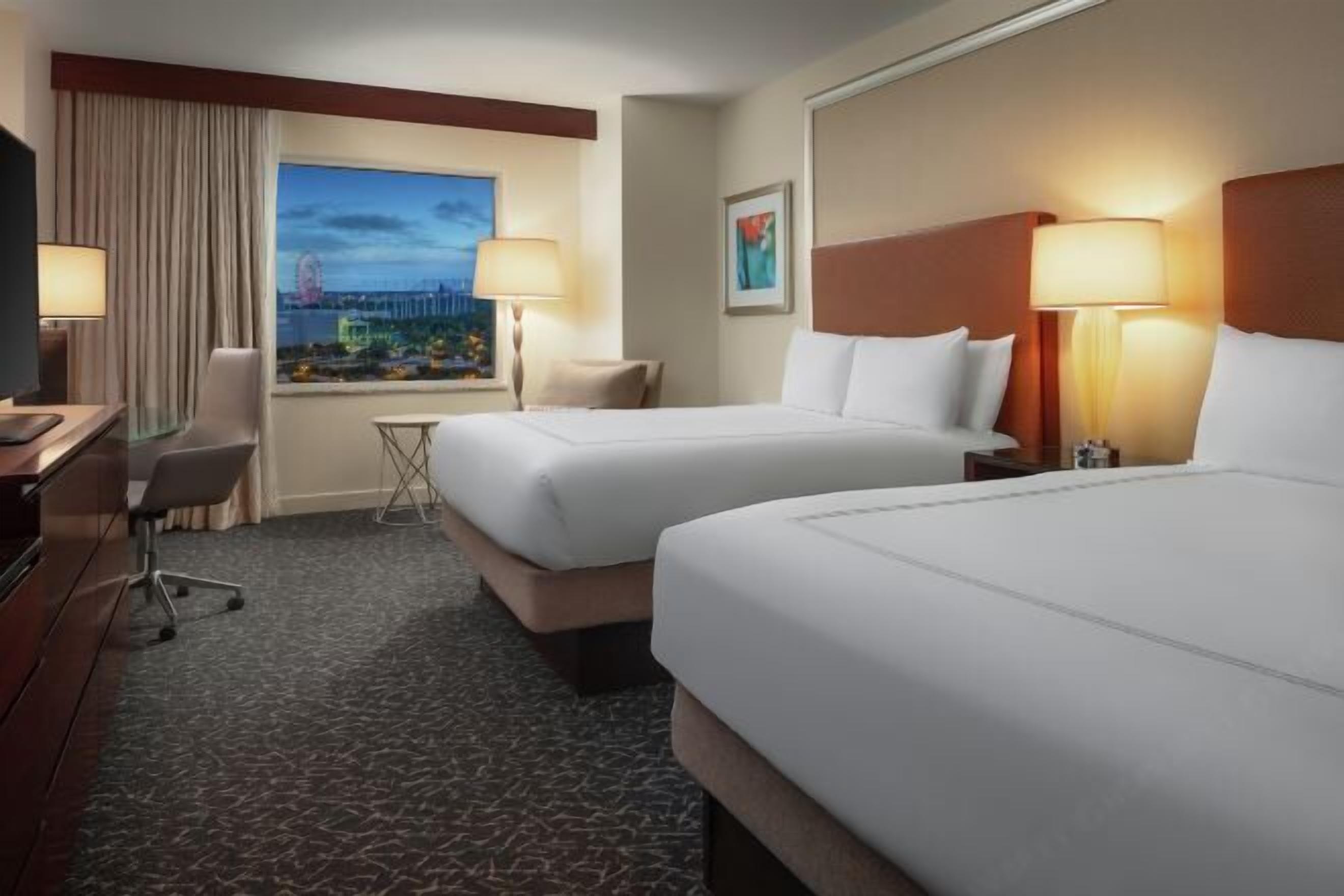 Premium bedding, down comforters, in-room safe, desk