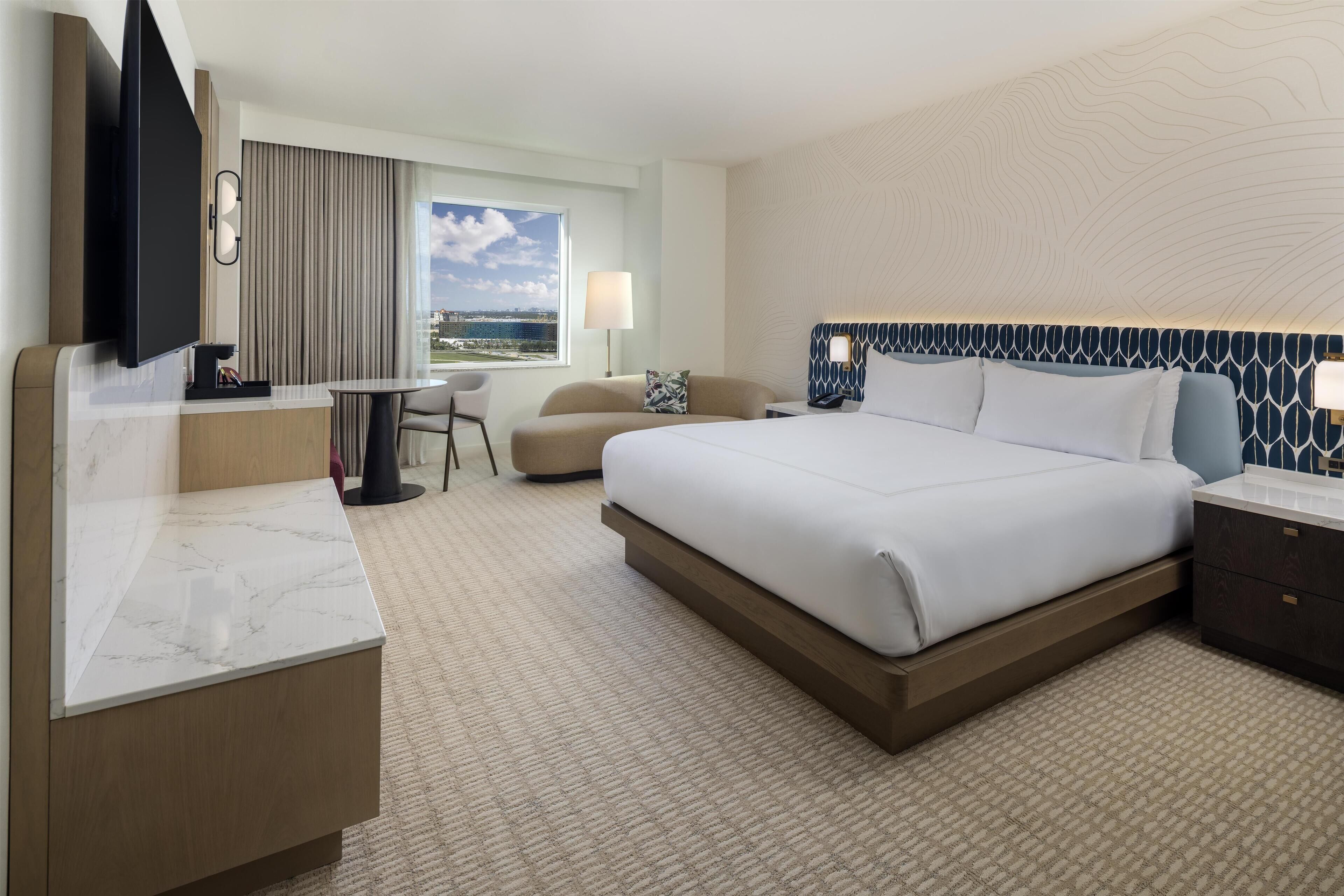 Premium bedding, down duvets, in-room safe, desk