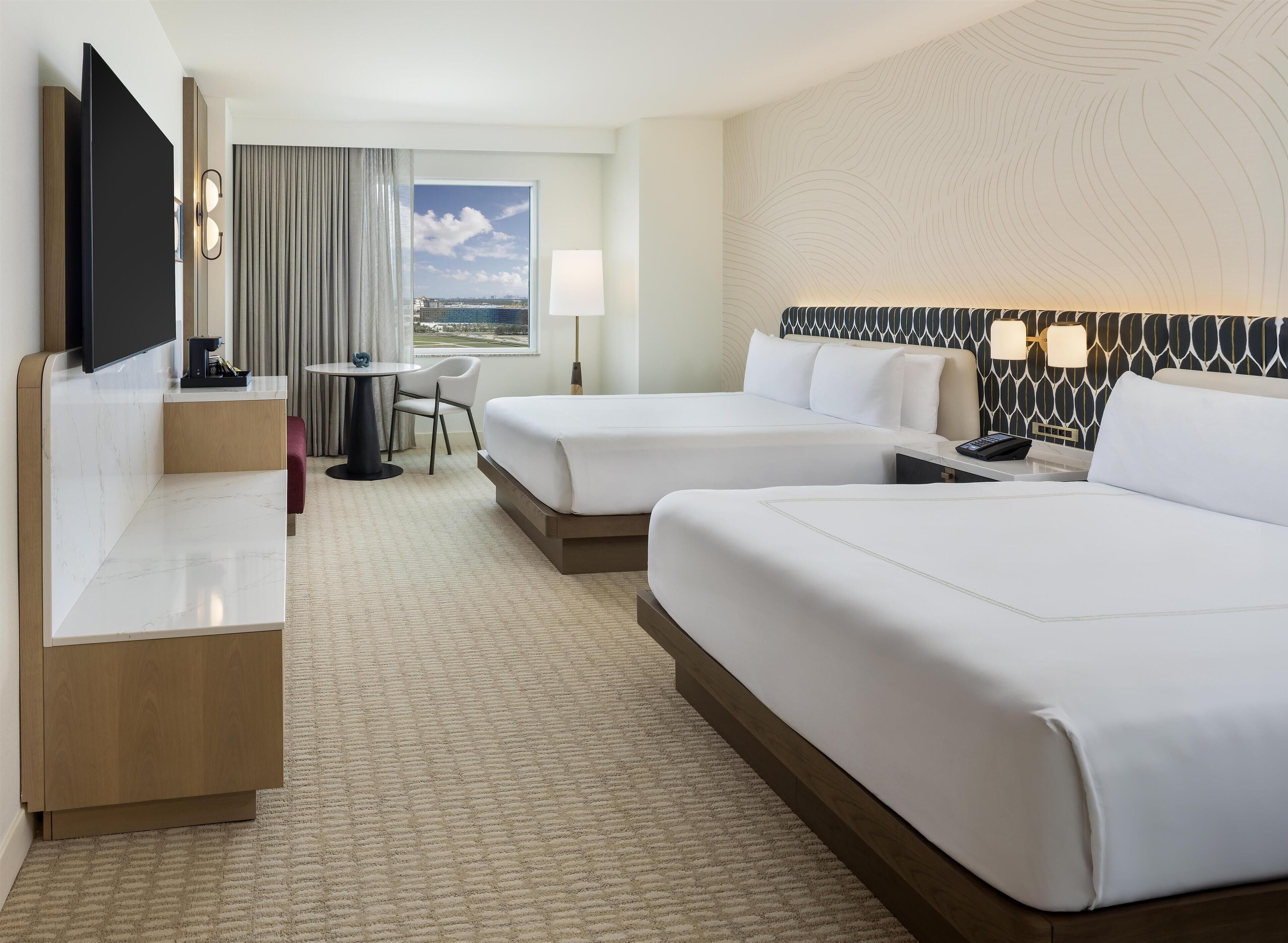 Premium bedding, down duvets, in-room safe, desk