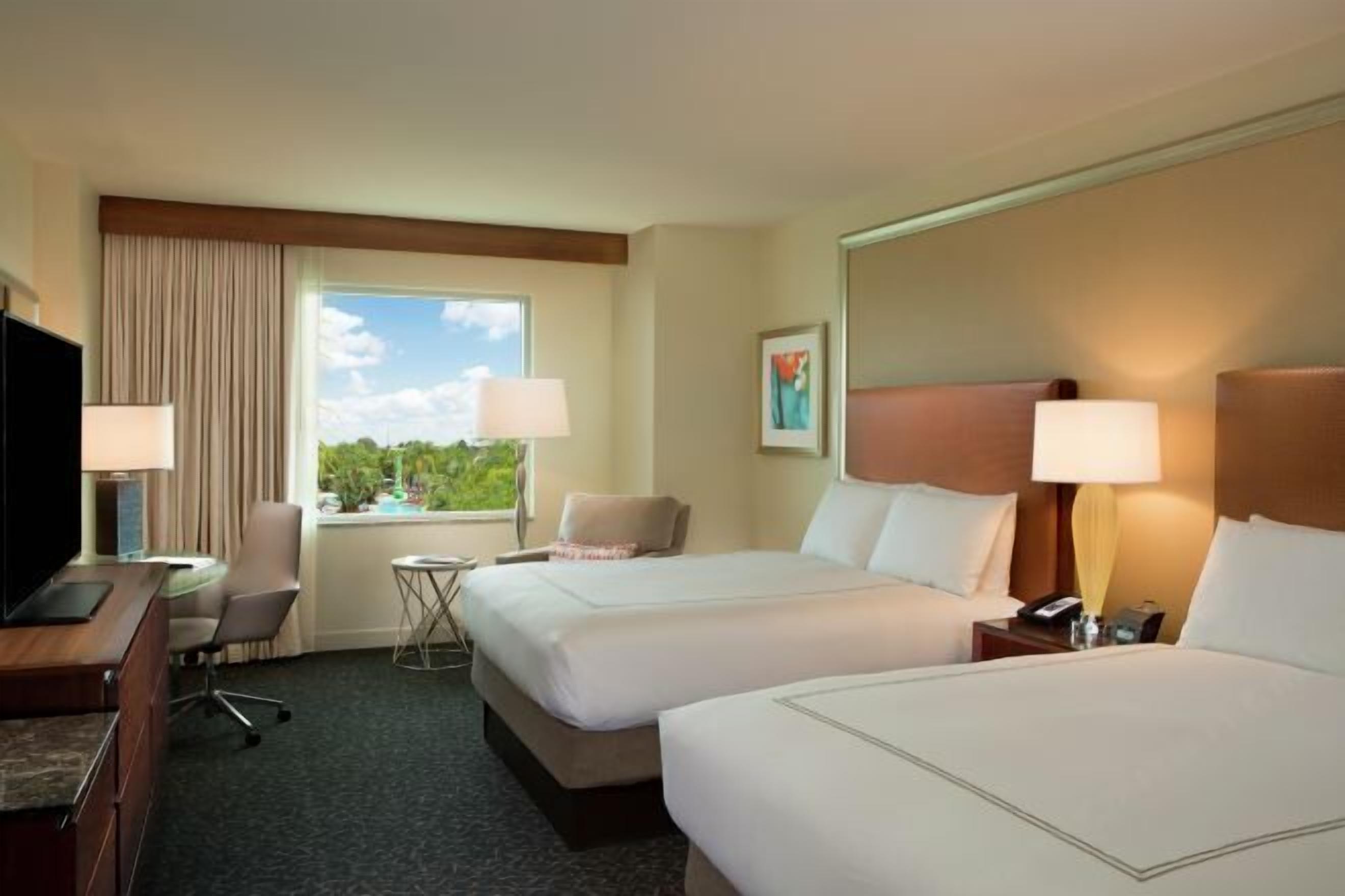 Premium bedding, down comforters, in-room safe, desk