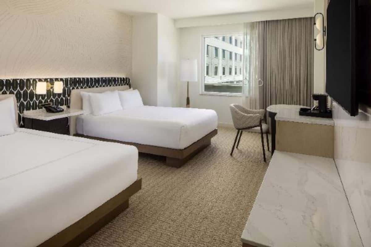 Premium bedding, down comforters, in-room safe, desk