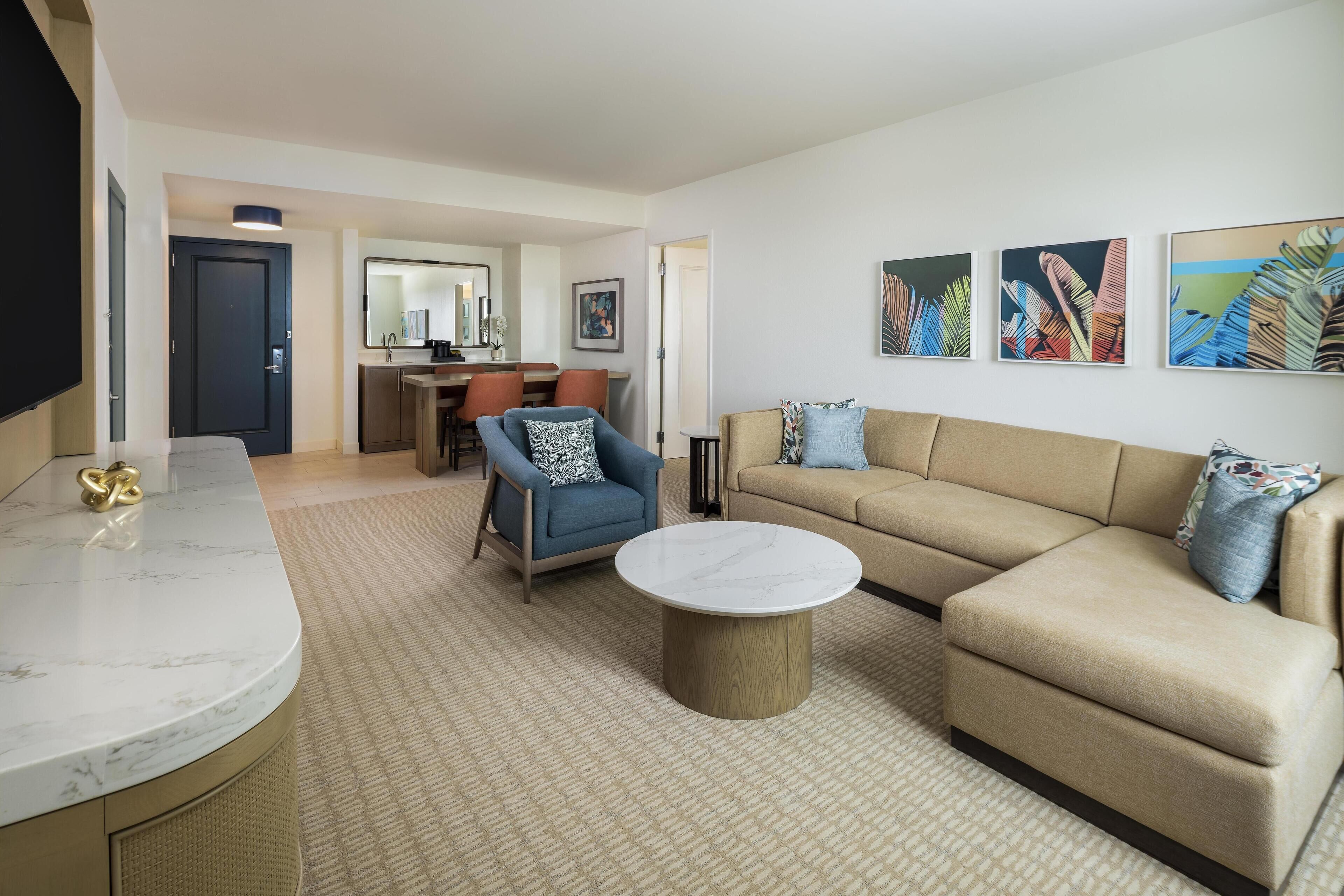 1 Bedroom Suite - 2 Queen Beds | Living area | 42-inch LCD TV with cable channels, TV, pay movies