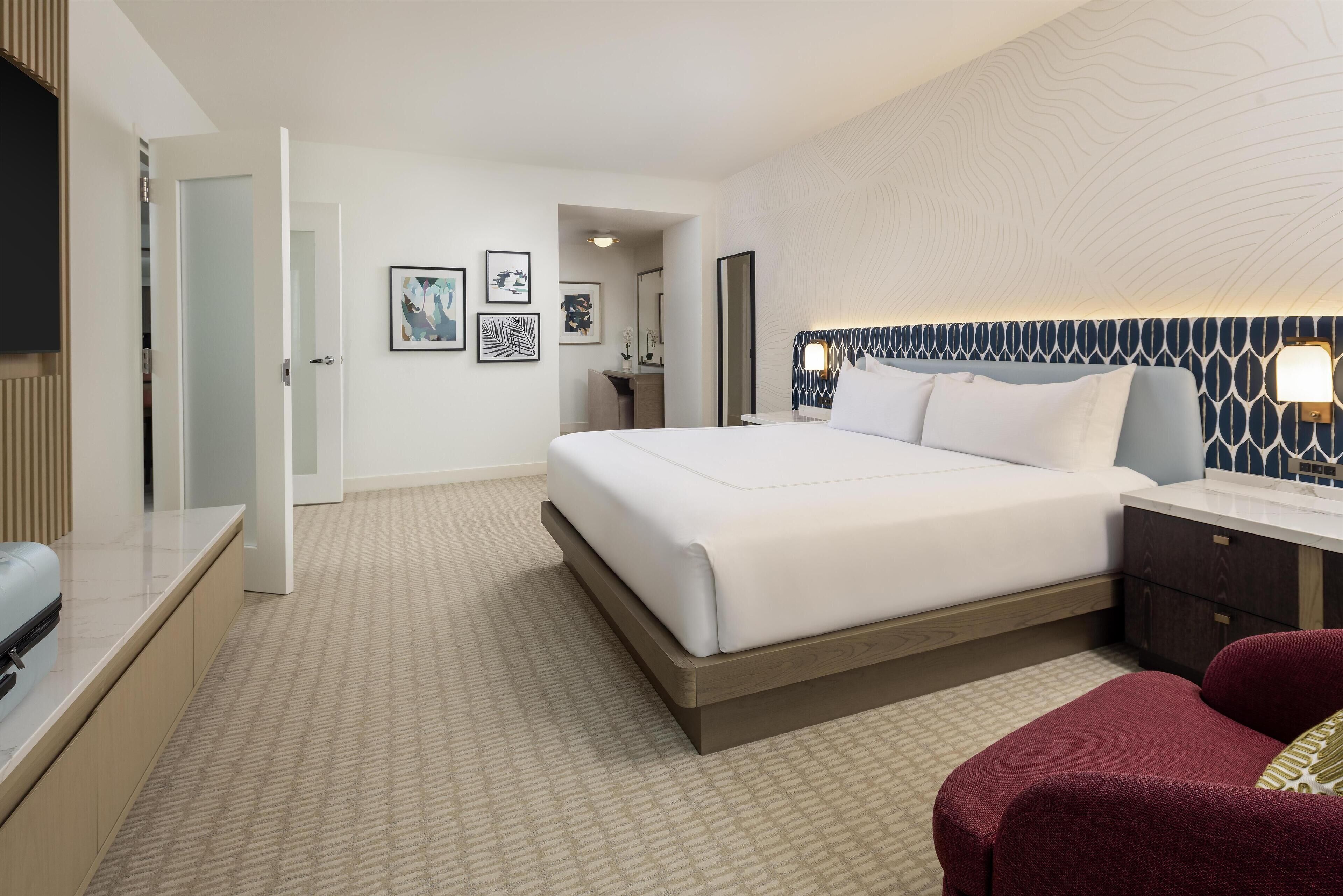 Premium bedding, down comforters, in-room safe, desk