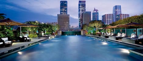 Outdoor pool, open 6:00 AM to 11:00 PM, pool umbrellas, pool loungers