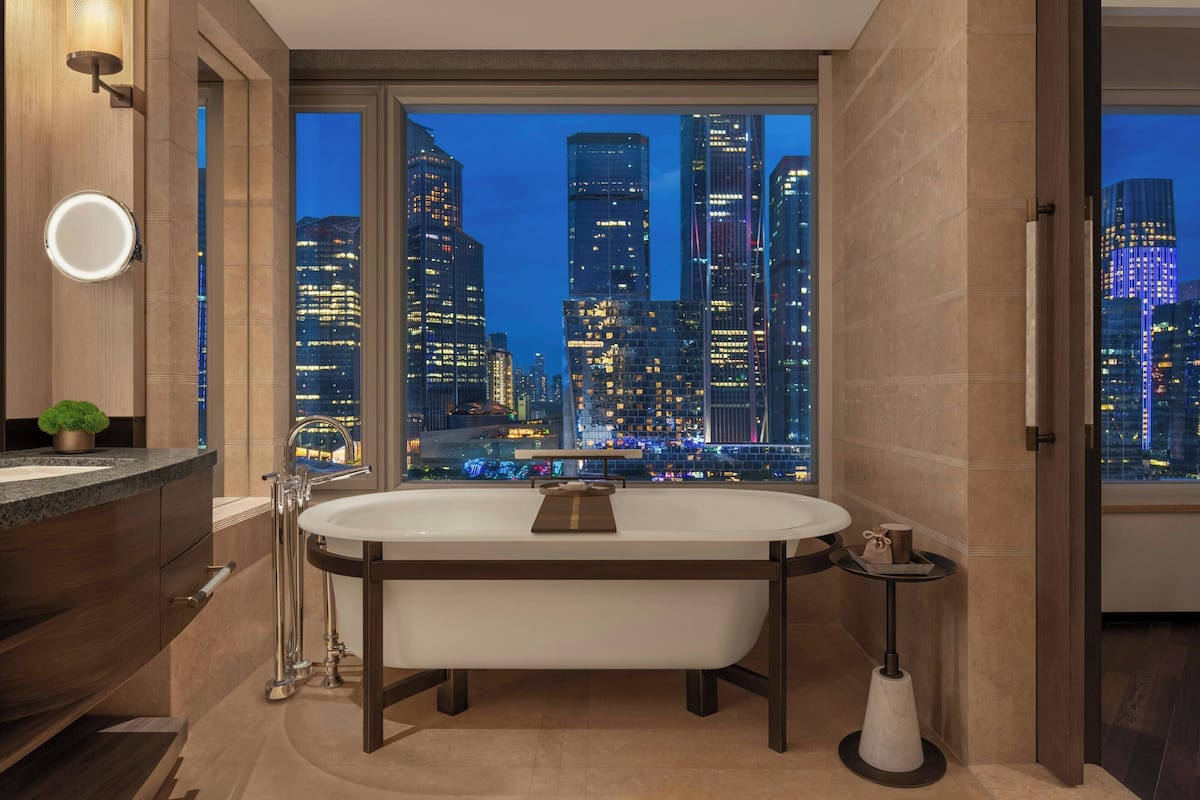 separate bathtub and shower, free toiletries, hair dryer, bathrobes