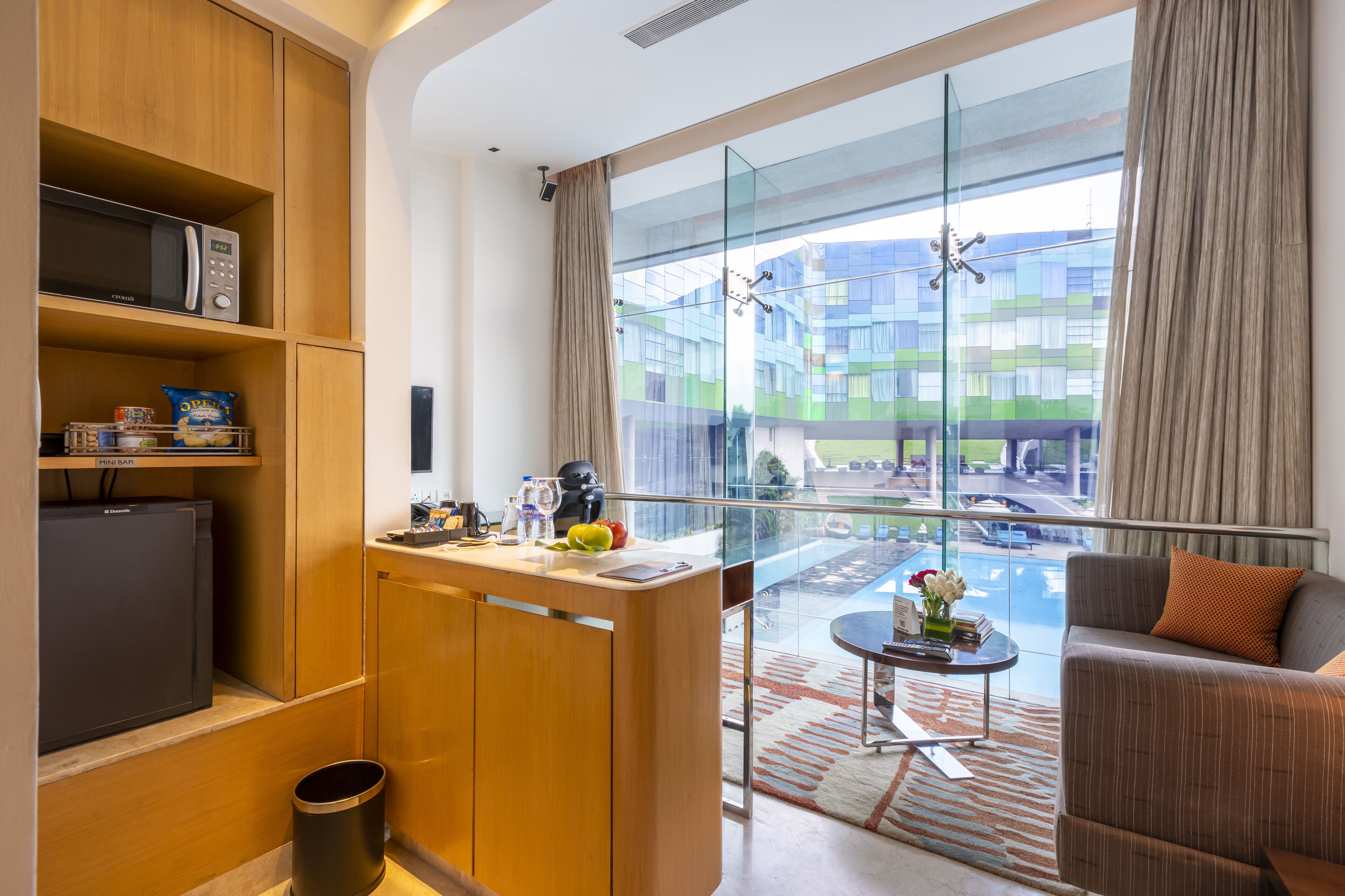 loft suite pool view king bed | private kitchenette | coffee/tea maker, electric kettle, high chair