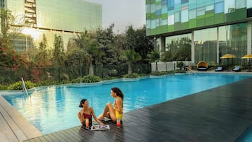 Outdoor pool, pool umbrellas, pool loungers
