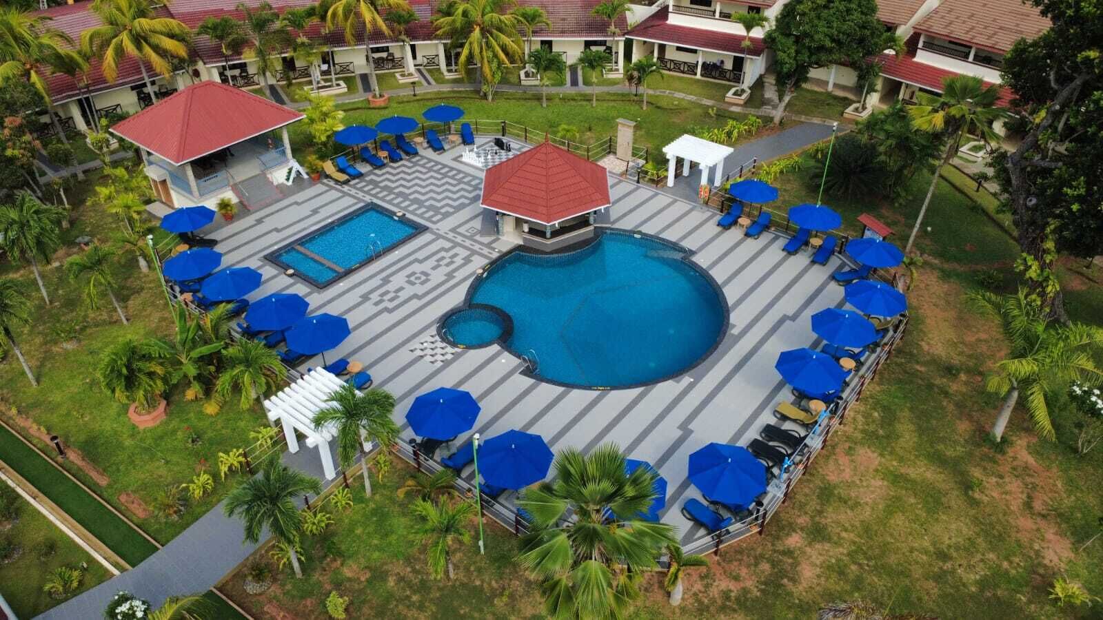 Outdoor pool, open 10 AM to 8 PM, pool umbrellas, sun loungers