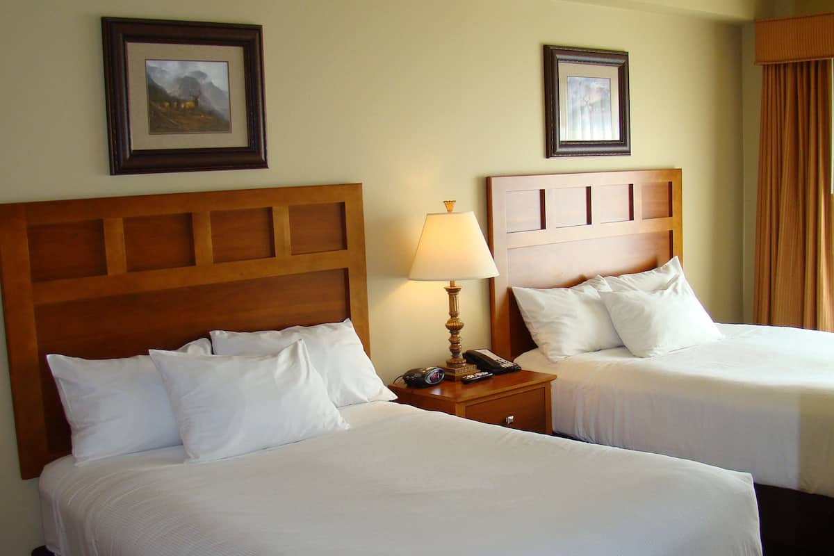Pillow-top beds, desk, laptop workspace, blackout curtains