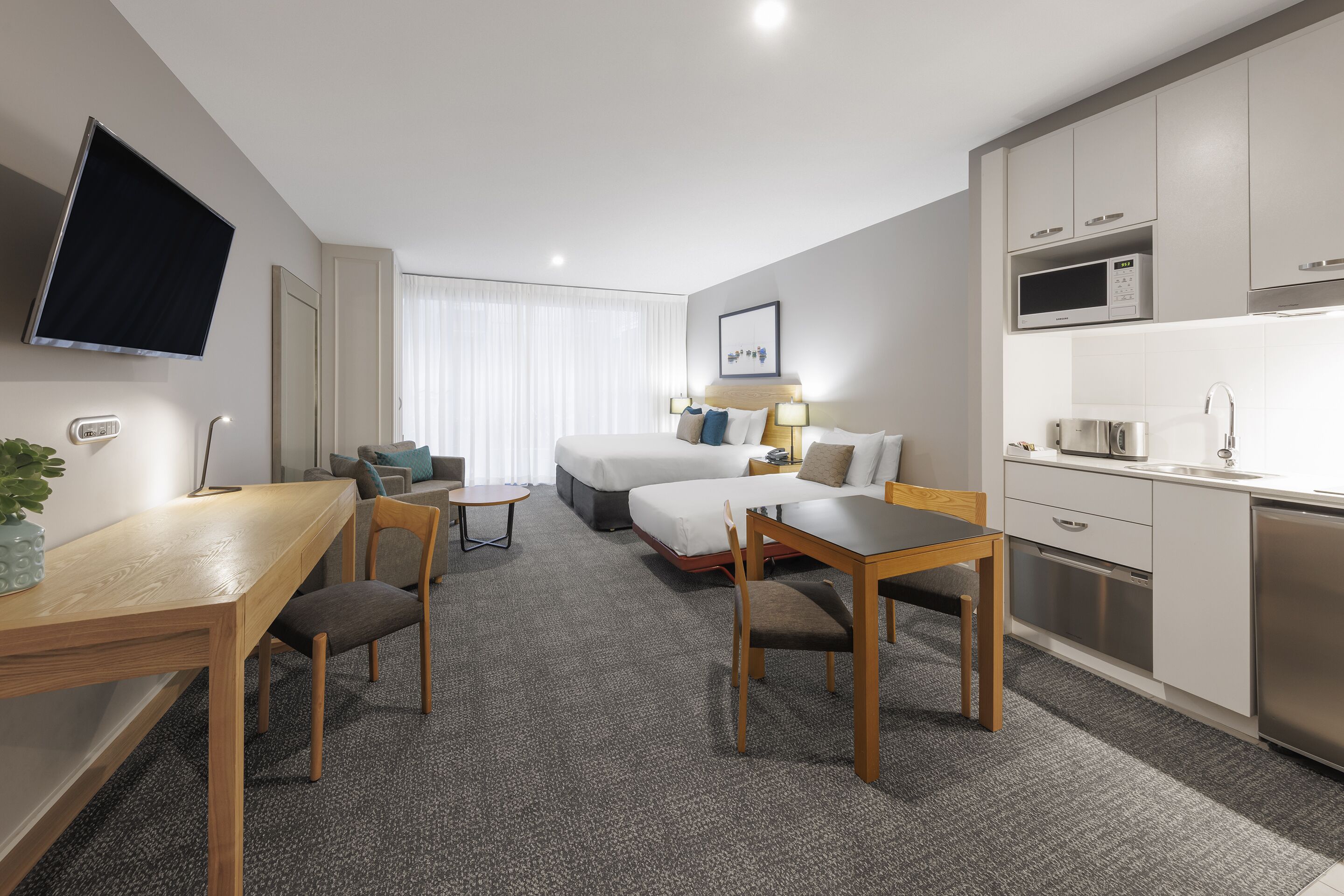 executive studio apartment | 1 bedroom, desk, laptop workspace, iron/ironing board