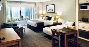 Desk, laptop workspace, iron/ironing board, cots/infant beds