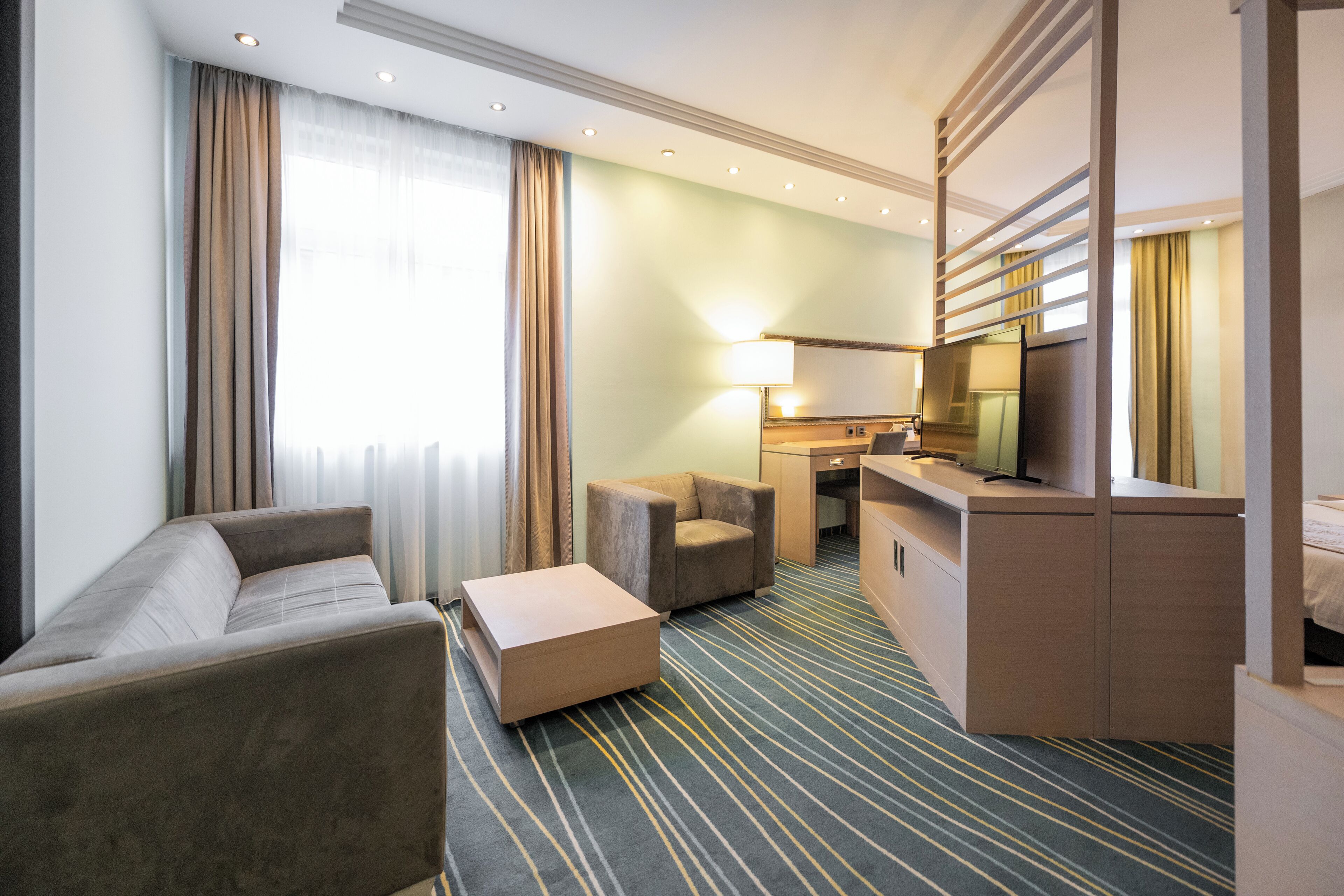 superior double room, 1 double bed, non smoking, city view | living area | lcd tv