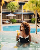 Outdoor pool, open 9:00 AM to 10:00 PM, free cabanas, pool umbrellas