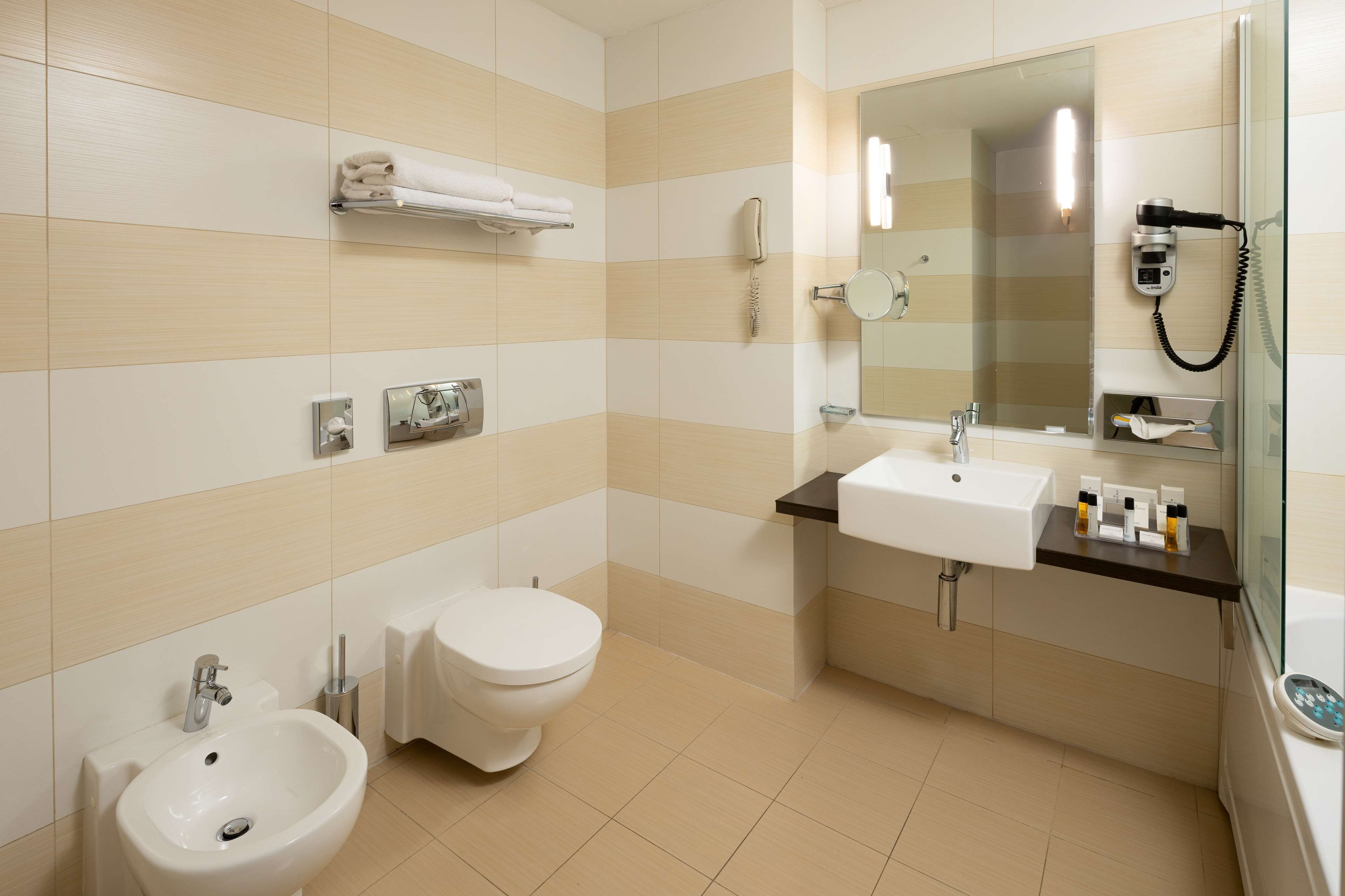 deluxe room, 1 king bed | bathroom | jetted bath, eco-friendly toiletries, hair dryer, bathrobes
