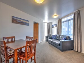 Two Bedroom Spa | Living area | 32-inch TV with satellite channels, DVD player - ASURE Hanmer Inn Motel (Hanmer Springs)