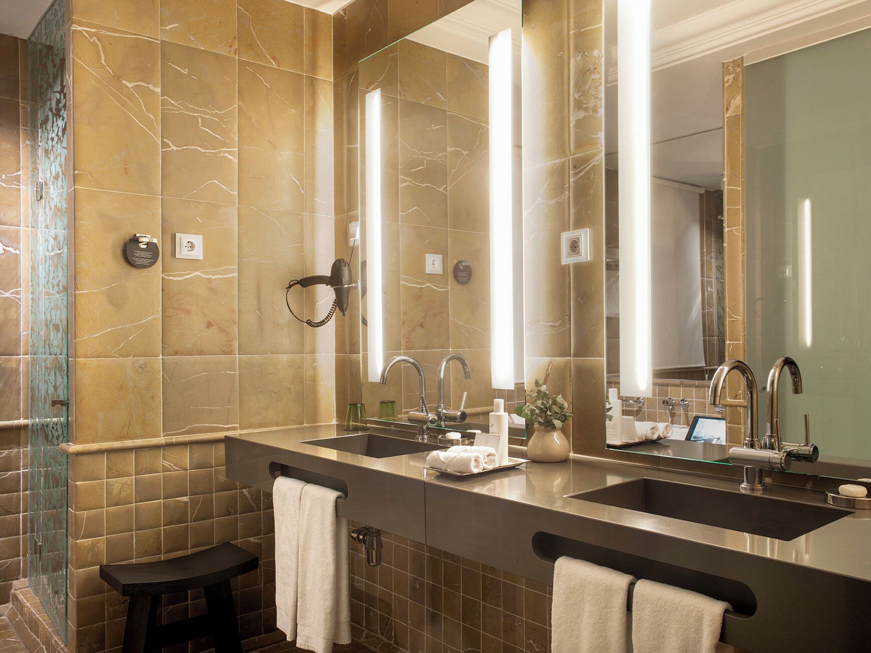 junior suite | bathroom | designer toiletries, hair dryer, bathrobes, slippers