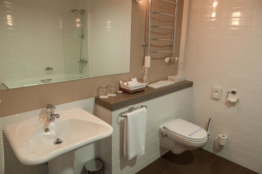 deluxe room, 1 single bed | bathroom | eco-friendly toiletries, hair dryer, towels