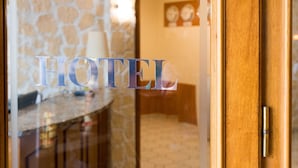 A hotel sign with the word "HOTEL" in large letters.