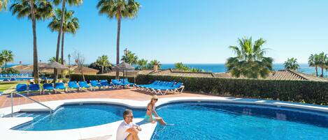 9 outdoor pools, pool umbrellas, pool loungers