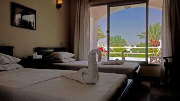 ميني بار وخزنة داخل الغرفة وواي فاي مجانًا وملاءات أسرّة