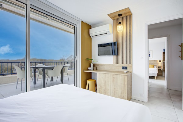 Superior Quadruple Room, Mountain View | Minibar, in-room safe, desk, laptop workspace