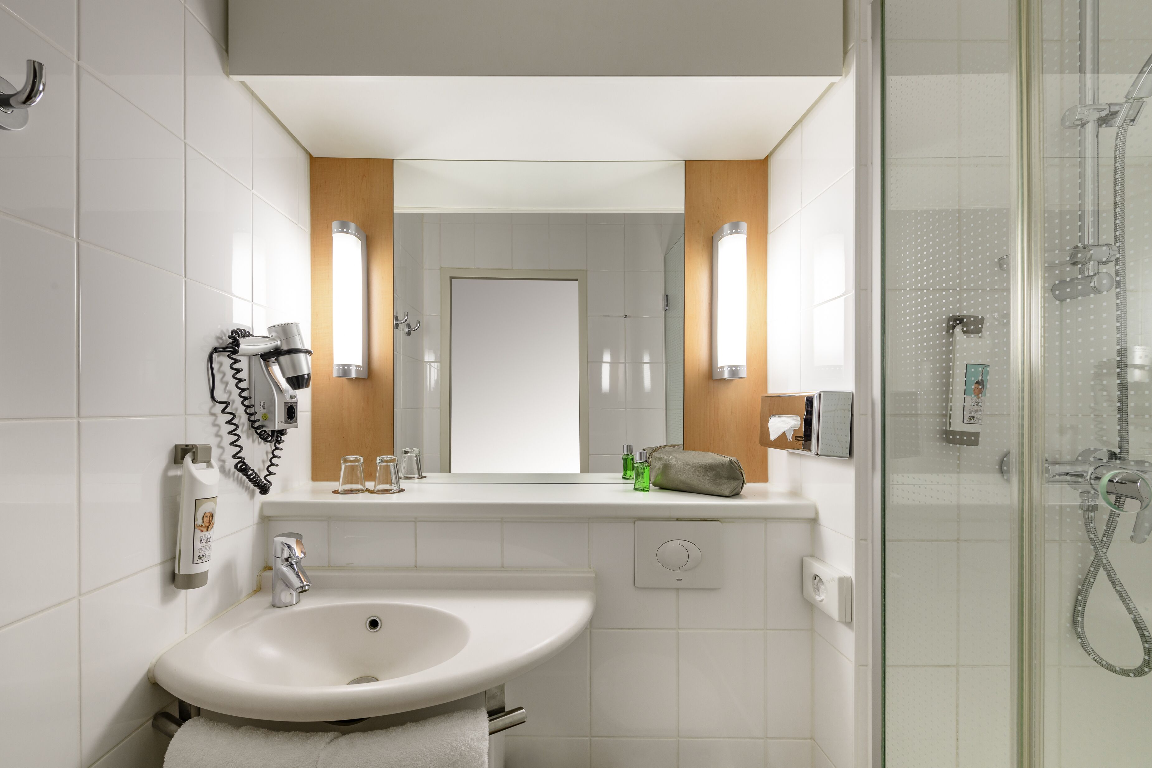 shower, eco-friendly toiletries, hair dryer, towels