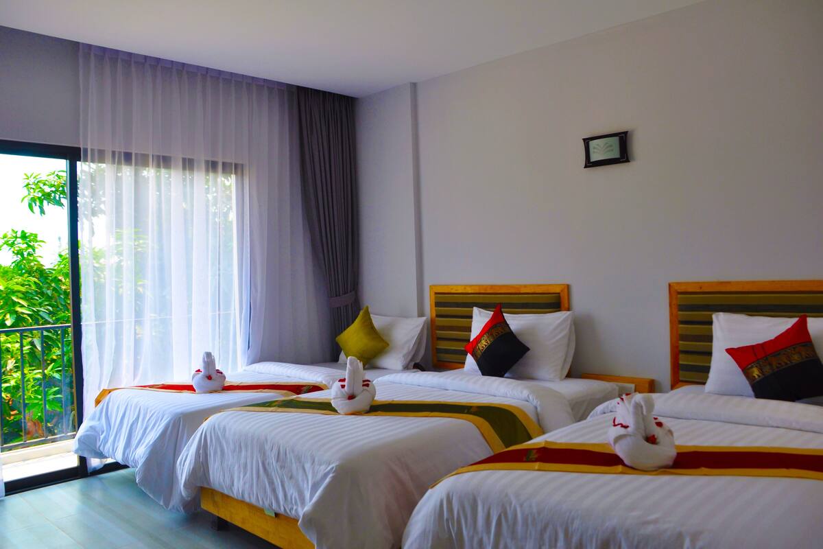 Superior Triple - Breakfast Included | Minibar, in-room safe, individually decorated, individually furnished