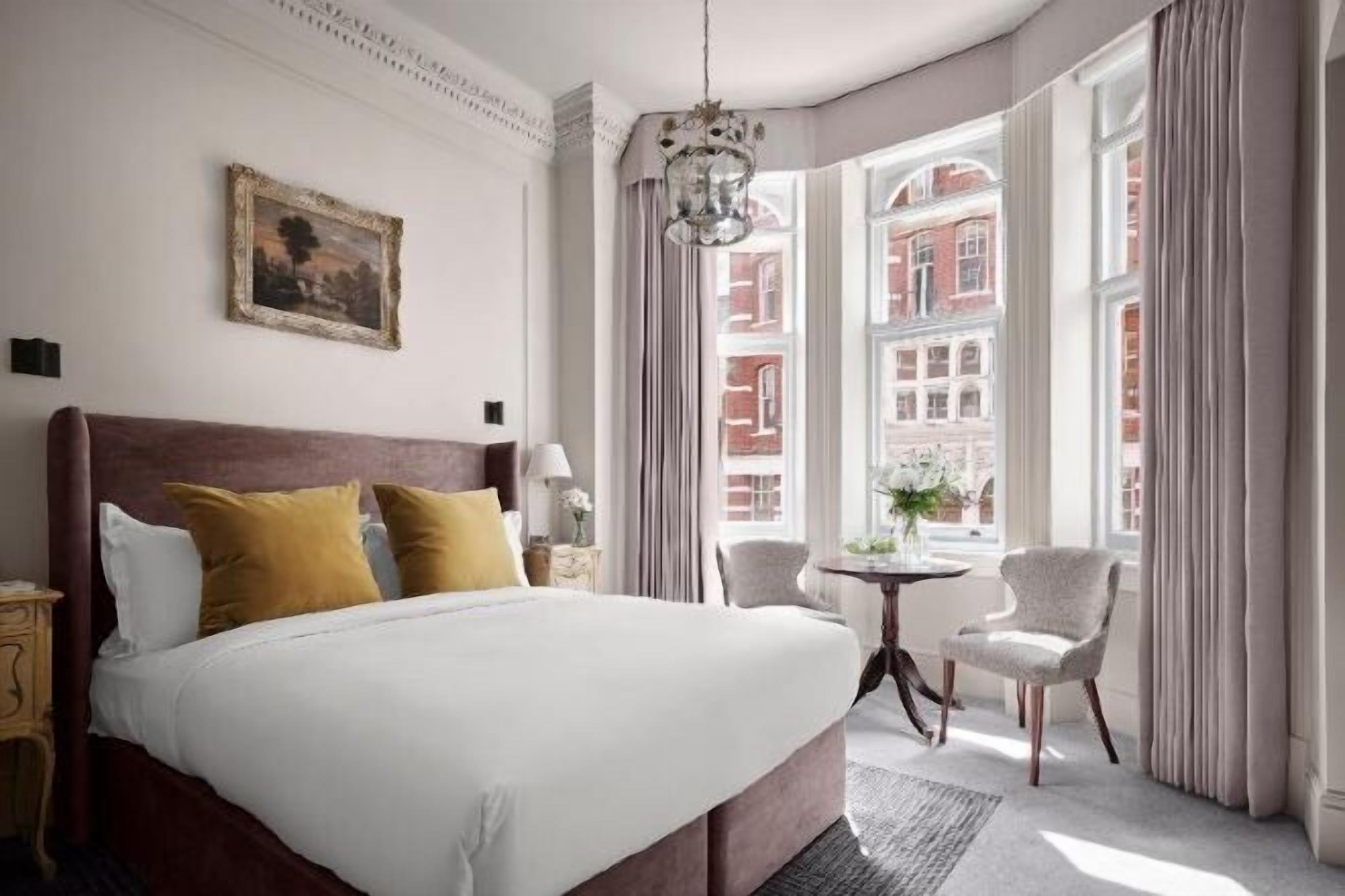 Premium bedding, down duvets, in-room safe, individually decorated