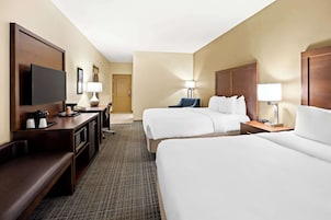 Desk, blackout drapes, iron/ironing board, free cribs/infant beds