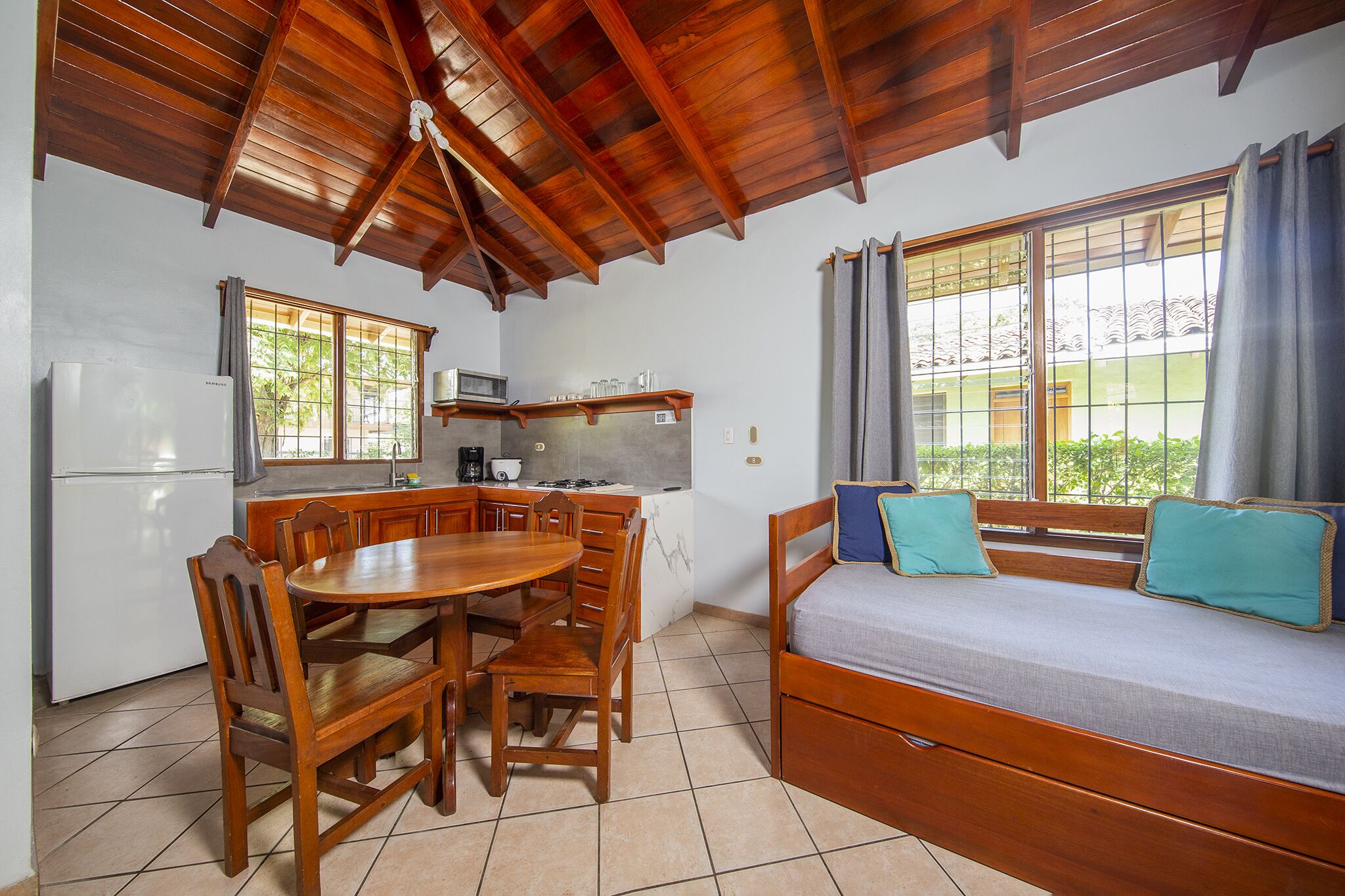 classic villa, 2 bedrooms, kitchenette, garden view | living area | 32-inch flat-screen tv with cable channels, tv