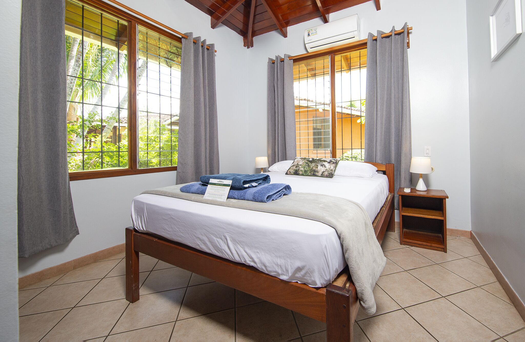 classic villa, 2 bedrooms, kitchenette, garden view | premium bedding, down duvets, individually decorated