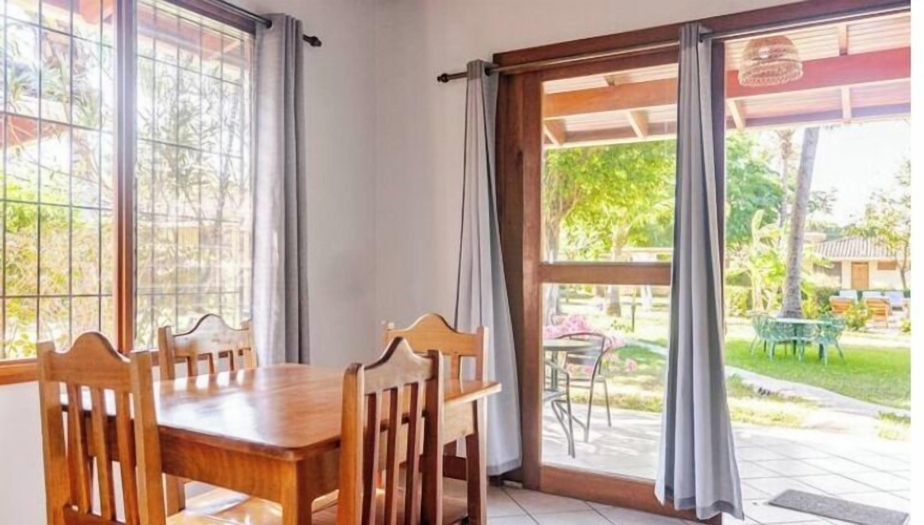 Superior Room, 1 King Bed, Refrigerator & Microwave, Pool View | Premium bedding, down comforters, individually decorated