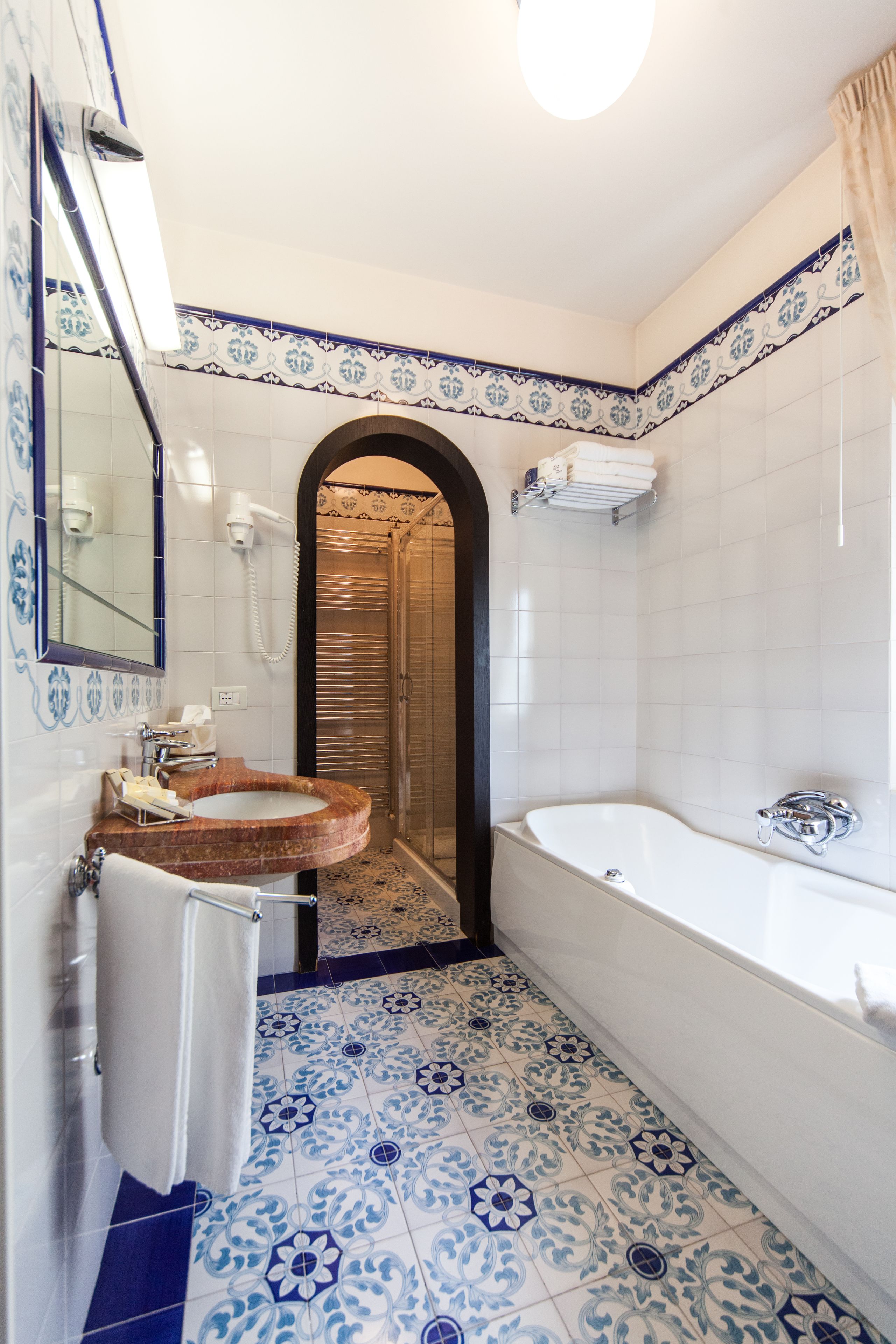 hydromassage showerhead, free toiletries, hair dryer, bathrobes