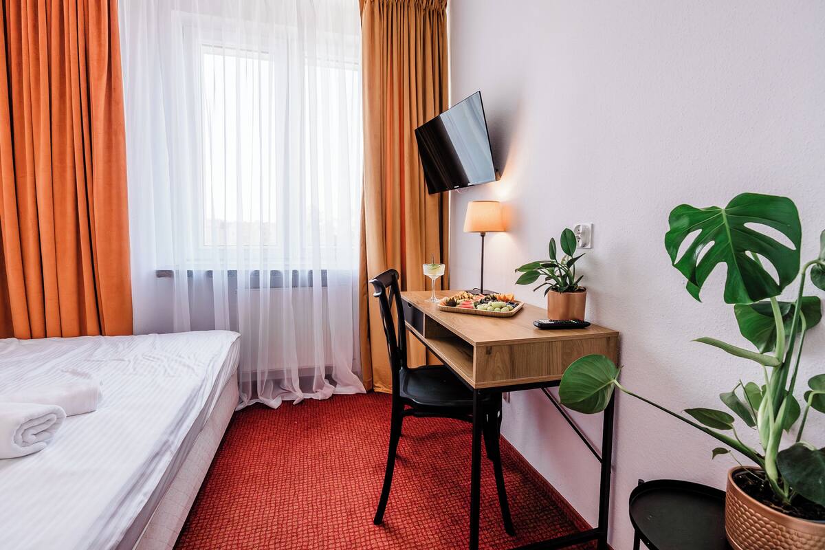 Family Room | Desk, blackout drapes, iron/ironing board (on request), WiFi (free)