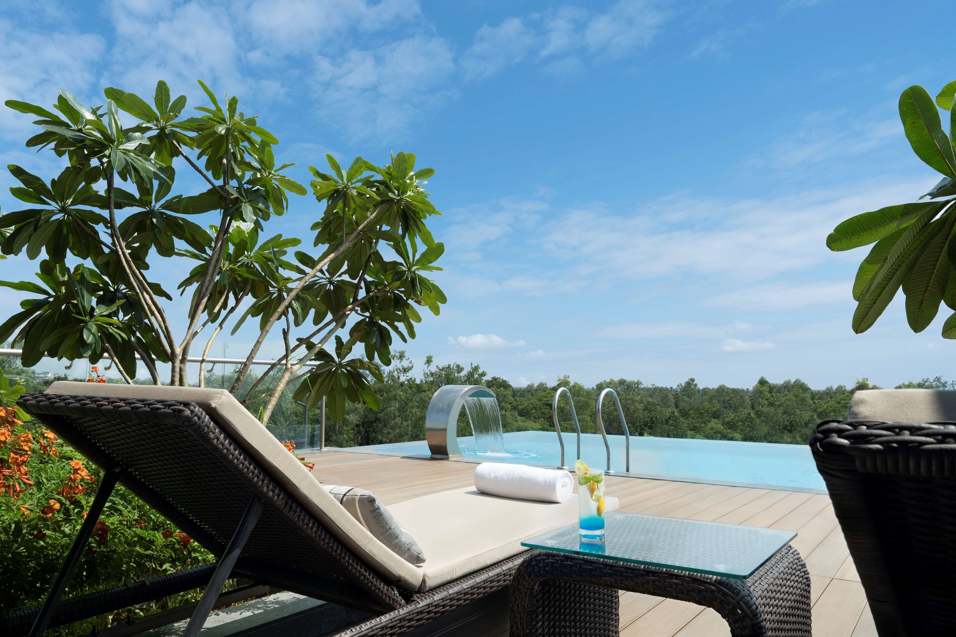 Outdoor pool, open 8:00 AM to 7:00 PM, sun loungers