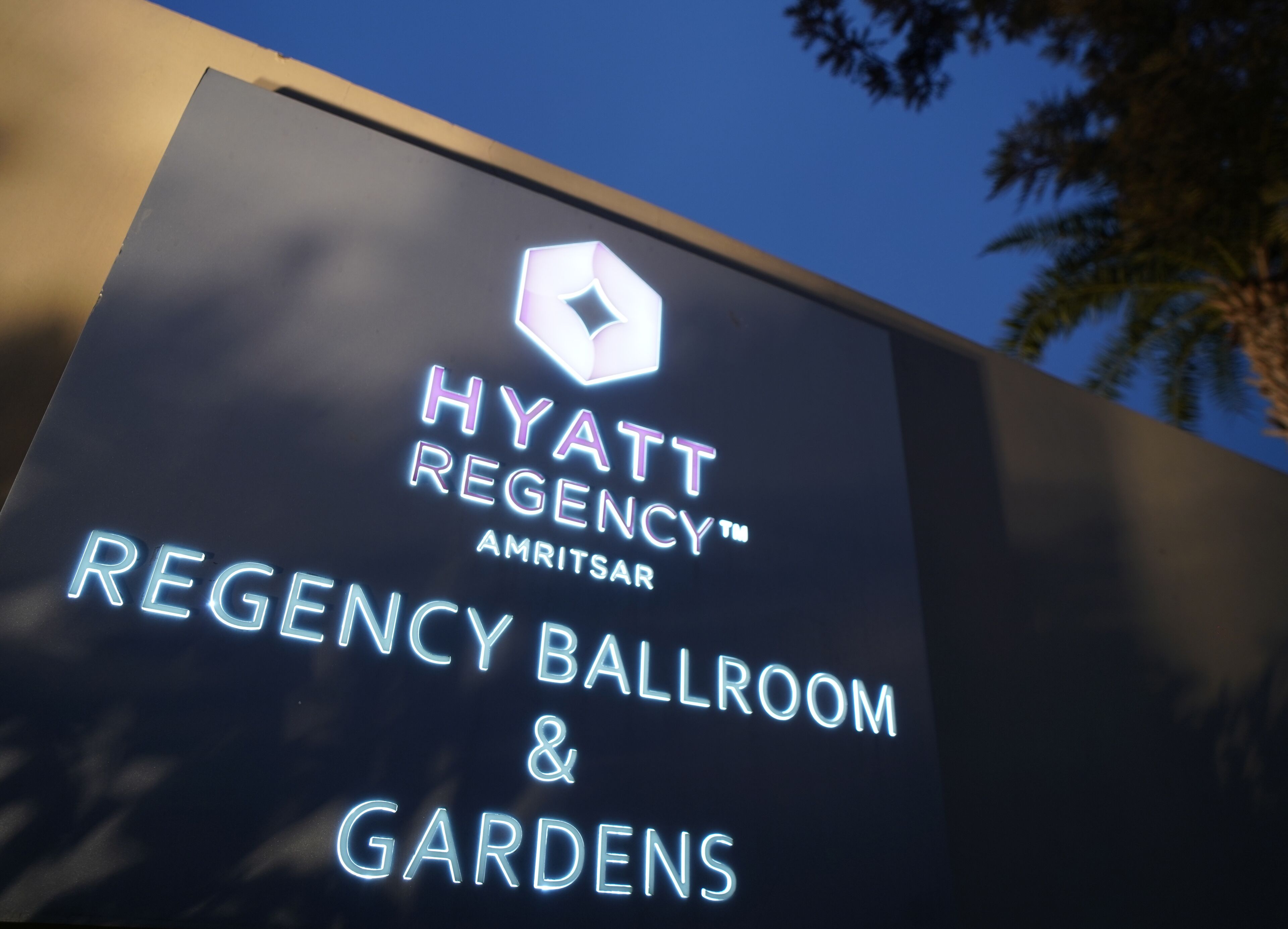 A sign for the Hyatt Regency Amritsar, highlighting the Regency Ballroom and Gardens.
