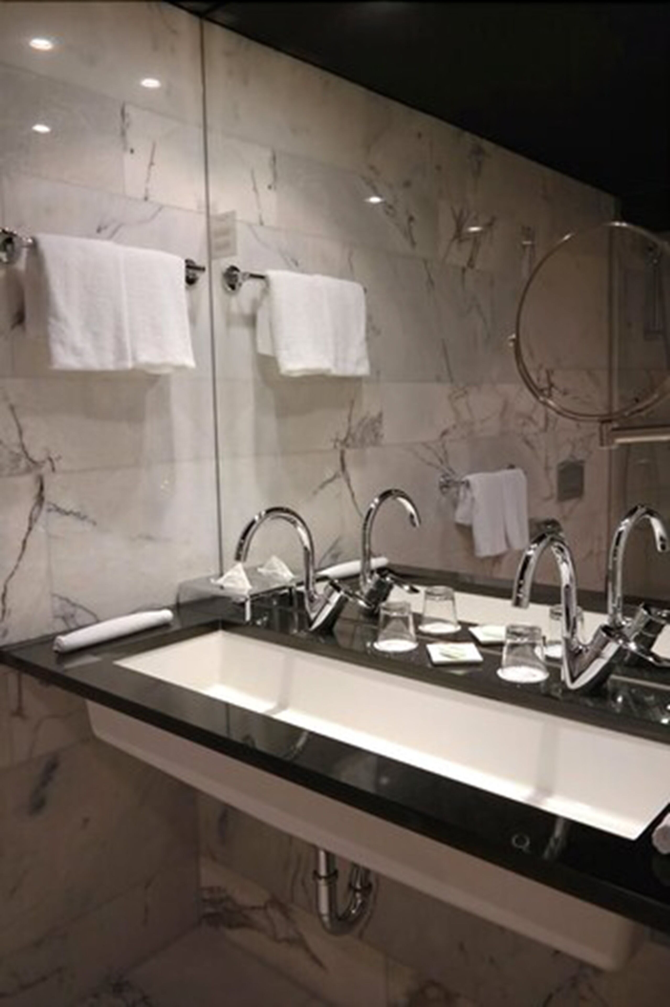 eco-friendly toiletries, hair dryer, towels