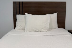 Desk, laptop workspace, free WiFi, bed sheets