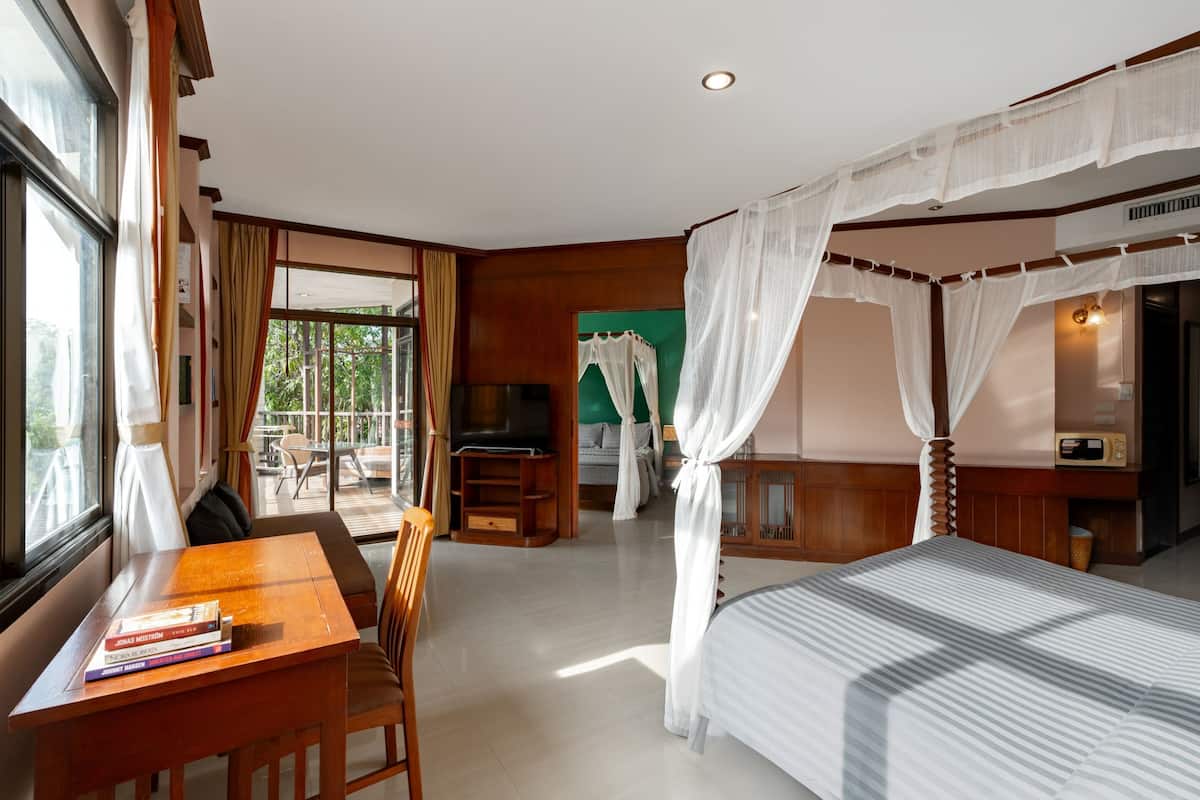 Family Room, 2 Bedrooms (Deluxe) | Minibar, in-room safe, desk, blackout drapes