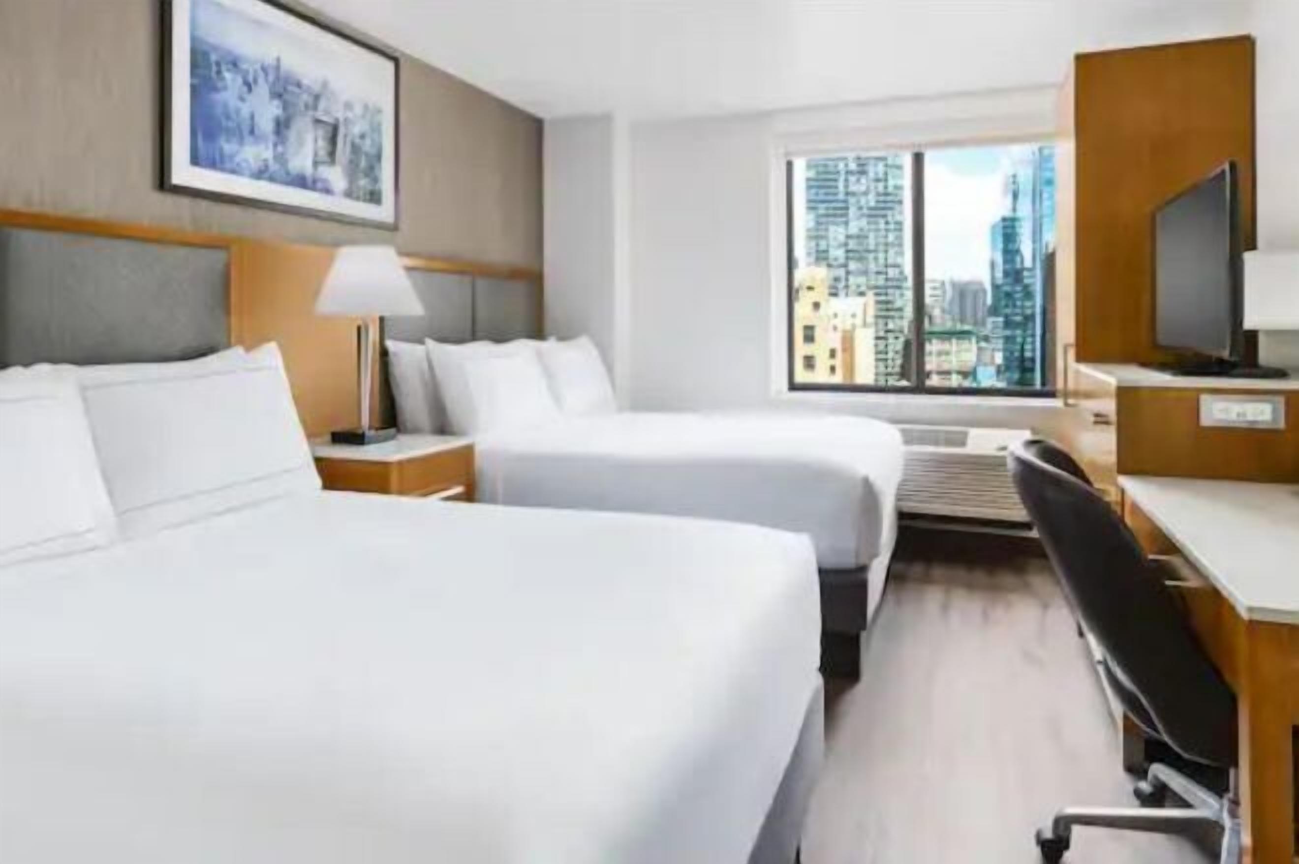 Hypo-allergenic bedding, in-room safe, blackout curtains