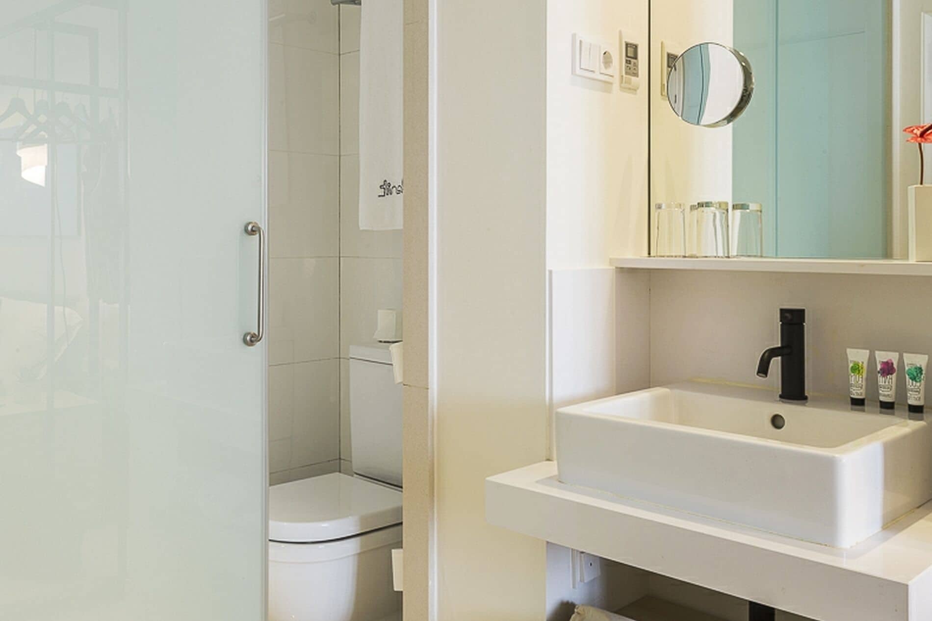 superior plus room | bathroom | shower, hair dryer, towels